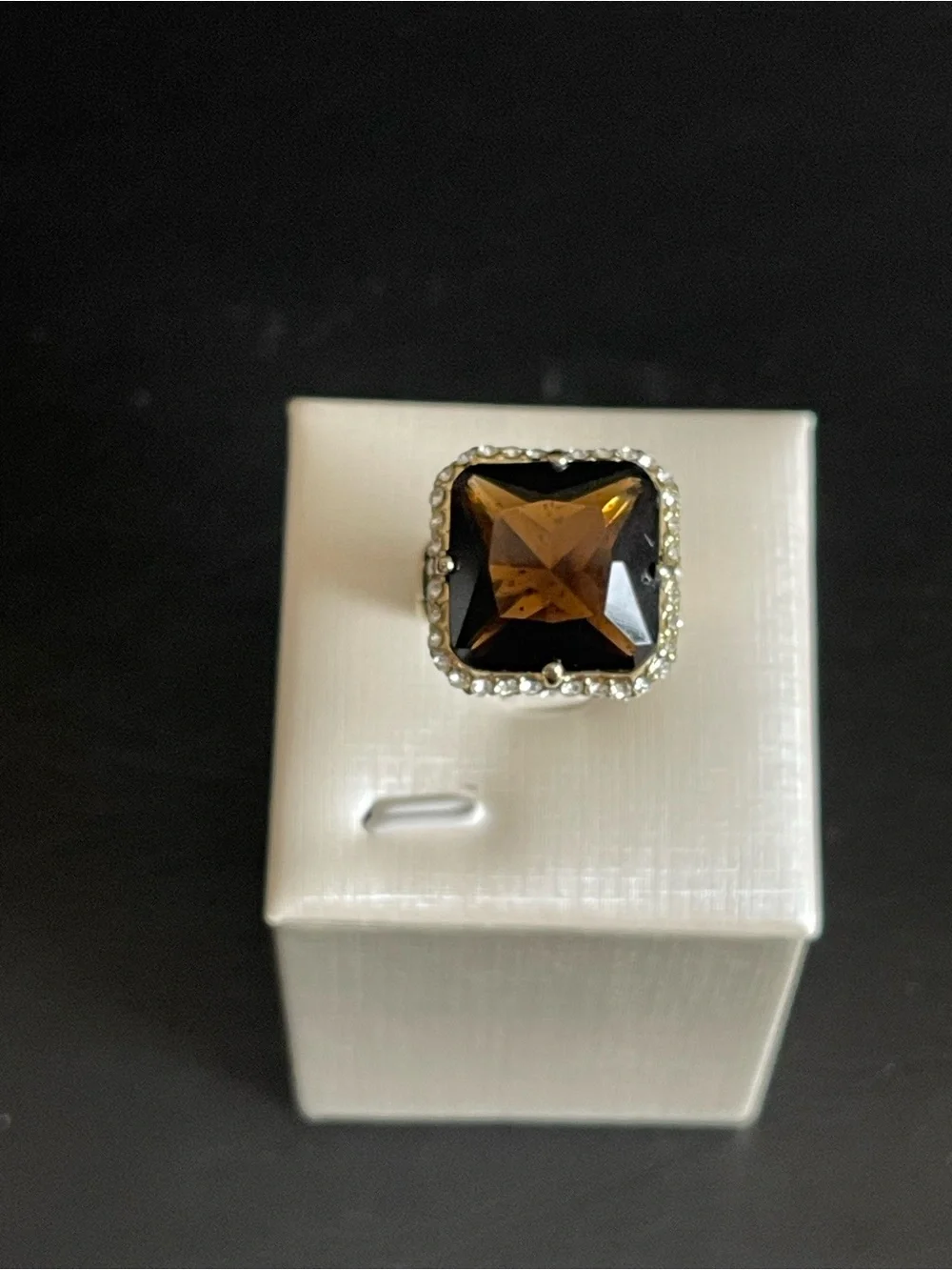 New gold tone simulated smoky quartz ring.